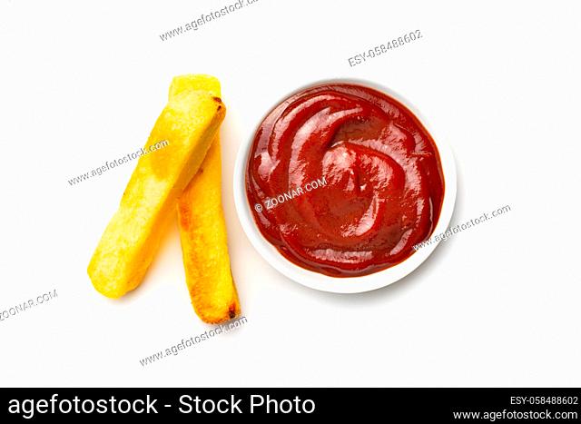 Big french fries. Fried potato chips with ketchup isolated on white background