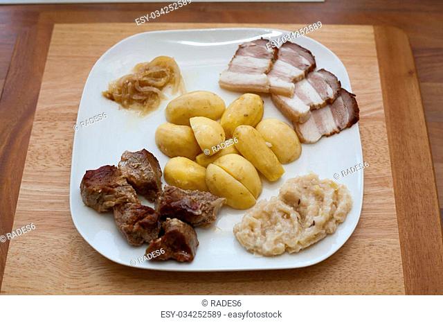 Roasted pork belly with cabbage and potatoes