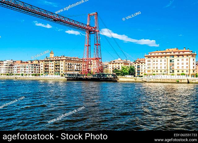 View from Portugalete, Spain: the famous Vizcaya Bridge built in 1893, declared a World Heritage Site by UNESCO and the town of Getxo in the background