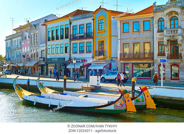 AVEIRO, PORTUGAL - JUL 01, 2017: Traditional Moliceiro boats on main city canal in Aveiro, Portugal in a summer day