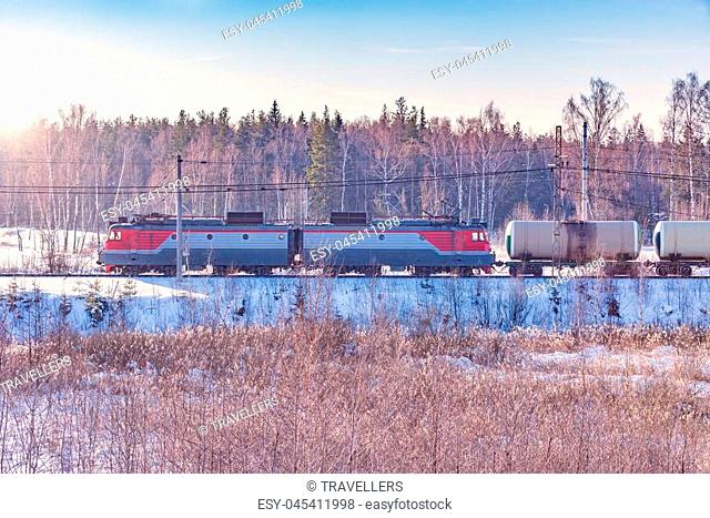 Freight train at cold winter morning time