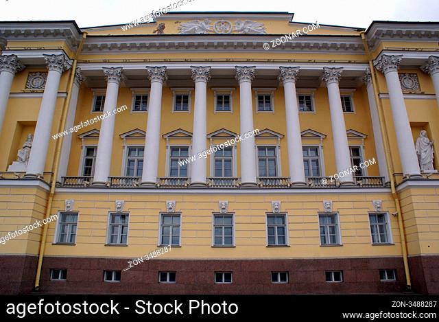 Facade of yellow building in St-Petersburg, Russia