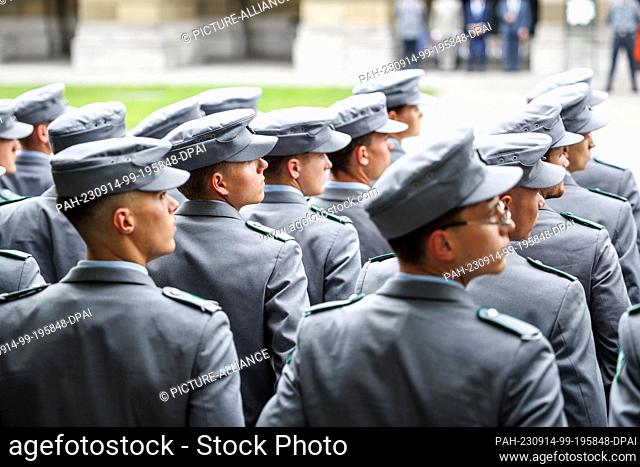 14 September 2023, Bavaria, Munich: Recruits stand during a ceremonial pledge by about 180 recruits of the mountain infantry battalions 232 and 233 from...