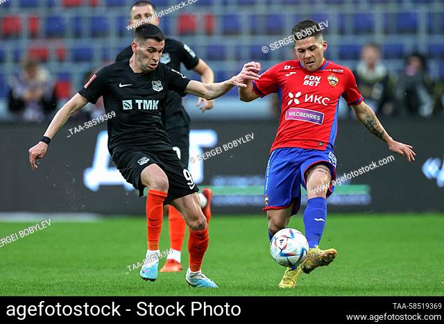 RUSSIA, MOSCOW - APRIL 19, 2023: Ural's Lazar Randjelovic (L) and CSKA's Victor Mendez fight for the ball in Leg 1 of the 2022/2023 Russian Cup's RPL Path Final...