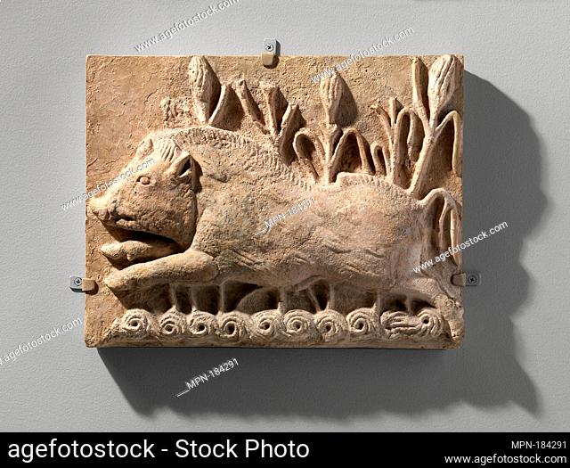 Wall panel with a charging boar. Period: Sasanian; Date: ca. 6th century A.D; Geography: Mesopotamia, Ctesiphon; Culture: Sasanian; Medium: Stucco; Dimensions:...