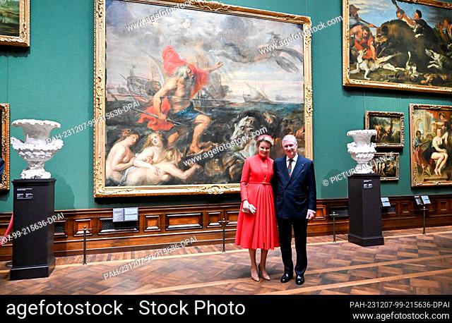 07 December 2023, Saxony, Dresden: King Philippe and Queen Mathilde of Belgium stand in front of the painting ""Quos ego"" by Peter Paul Rubens during their...
