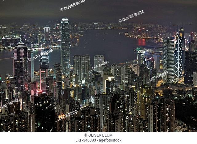 View of Hong Kong from Victoria Peak over Victoria Harbour and the illuminated skyscrapers at night, Hong Kong, China