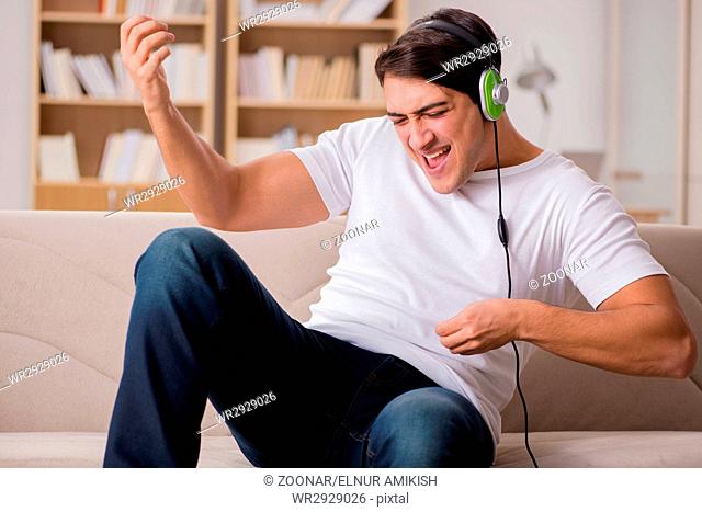 Handsome man listening to the music