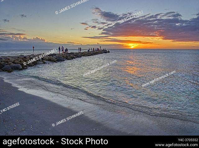 People on the North Jetty into the Gulf of Mexico in Nokomis Florida in the United States