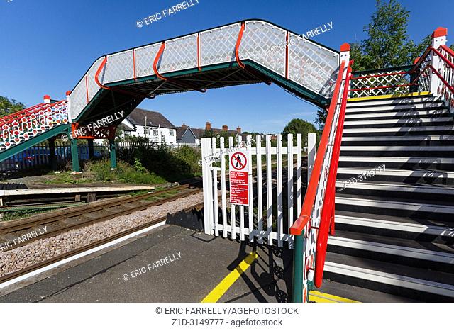Platform bridge staircase and warning signs, at llanfairpwllgwyngyllgogerychwyrndrobwllllantysiliogogogoch, station, North Wales. ,