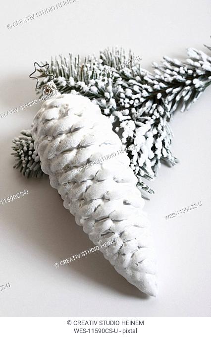 Christmas tree decoration, fir cone and fir branch, close-up