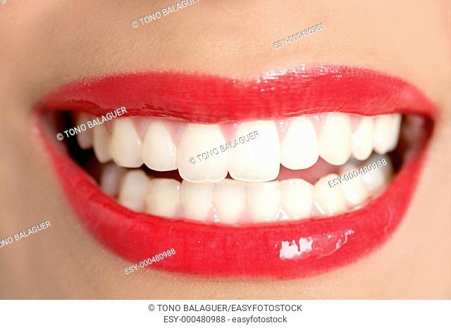 Beautiful woman perfect teeth smile with red lips