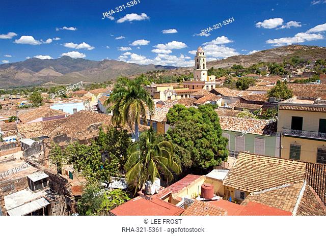 View over pantiled rooftops of the town towards the belltower of The Convento de San Francisco de Asis, Trinidad, UNESCO World Heritage Site, Cuba, West Indies