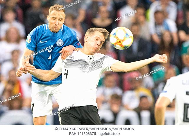 Sander PURI (left, EST) in the head duel with Matthias GINTER (GER), action, duels, dogfights, football Laenderspiel, EM qualification