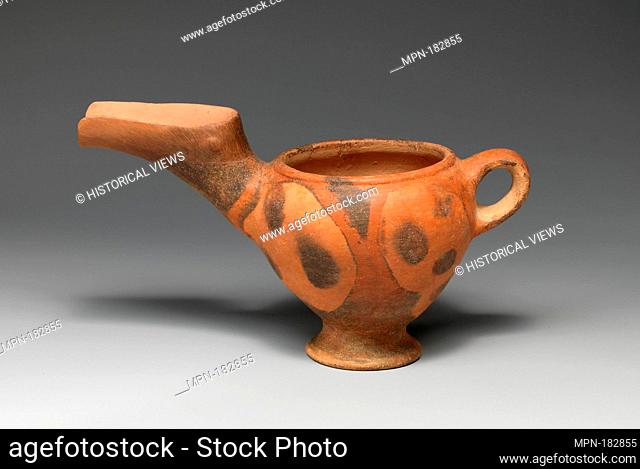 Terracotta beak-spouted jar. Period: Early Minoan II; Date: ca. 2600-2200 B.C; Culture: Minoan; Medium: Terracotta; Dimensions: H. 5 7/8 in. (14