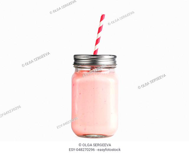 Pink strawberry smoothie in mason jar glass. Isolated on white with clipping path