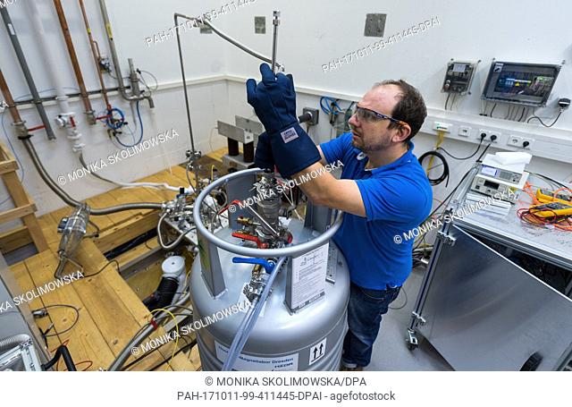 Physicist Tobias Foerster working in the High Magnetic Field Laboratory (Hochfeld-Magnetlabor, HLD) at the Helmholtz Research Centre in Dresden-Rossendorf