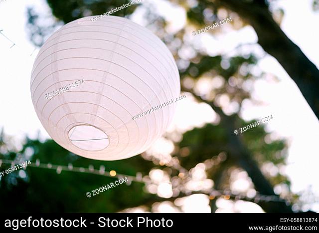 Paper lanterns. A garland of paper balls. High quality photo