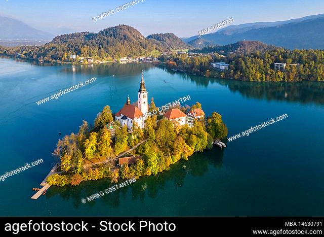Aerial view of Bled island on Lake Bled in autumn at sunset. Bled, Upper Carniola, Slovenia, Europe