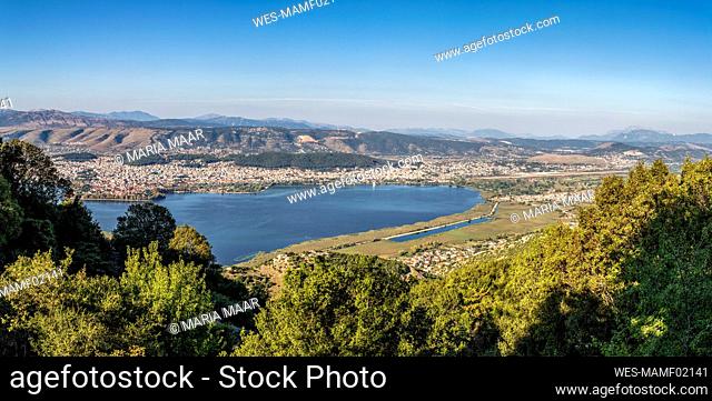 Greece, Epirus, Ioannina, Panoramic view of Lake Pamvotida and surrounding city in summer