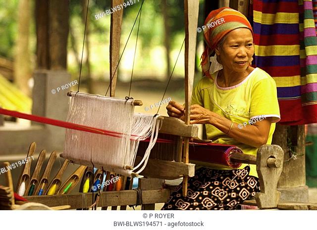 older woman weaving in Hanoi, Vietnam