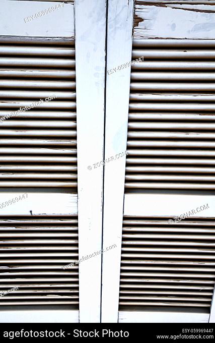 window varese palaces italy  abstract sunny day  wood venetian blind in the concrete brick besnate