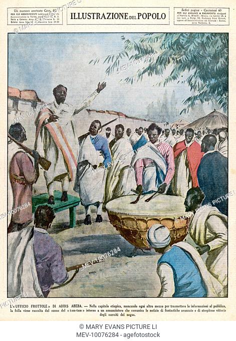 A man summons the people of the village with the sounds of a drum to hear the announcement of victories in Addis Ababa