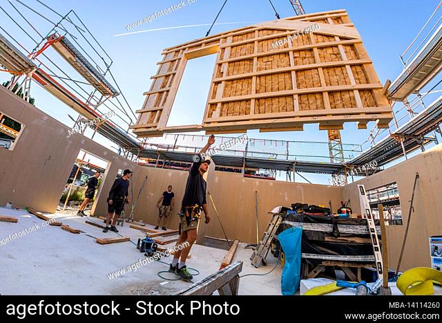 germany, bavaria, construction of a prefabricated wooden house, installation of the partition walls
