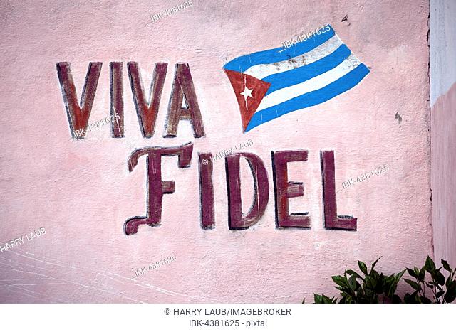Painted wall with the flag of Cuba and the words Viva Fidel, Santiago of Cuba, Santiago de Cuba Province, Cuba