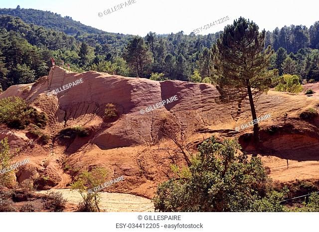 red landscape dug by six generations of miners ocher Colorado Provencal at Rustrel in the south of France