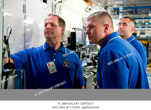 NASA astronaut Kevin Ford (left), Expedition 33 flight engineer and Expedition 34 commander; along with Russian cosmonauts Oleg Novitskiy (center) and Evgeny...