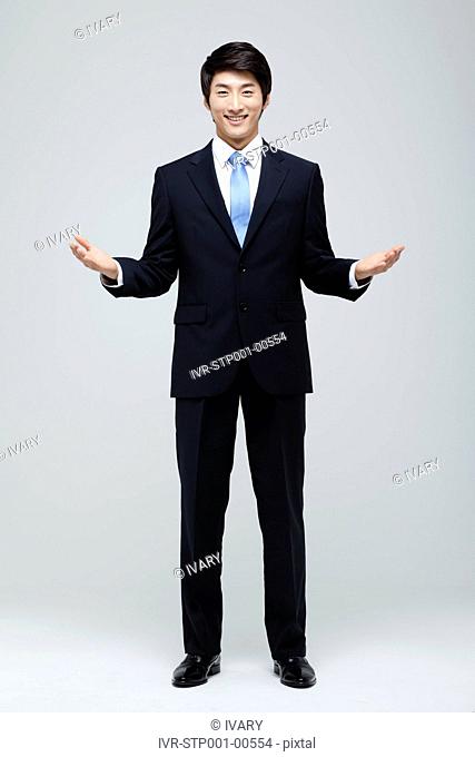 Portrait Of Smiling Asian Businessman