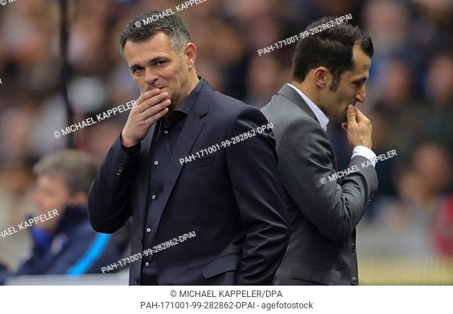 Bayern coach Willy Sagnol and sporting director Hassan Sali pictured during the German Bundesliga football match between Hertha BSC and Bayern Munich at the...