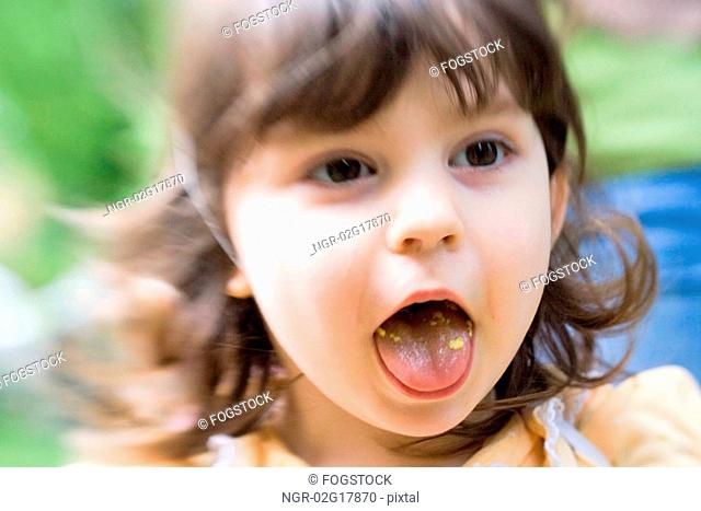 Girl Showing Food in Mouth