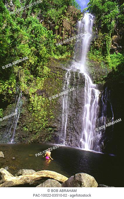 Hawaii, Maui, Pi'lani Highway, Woman swimming at Wailua Falls