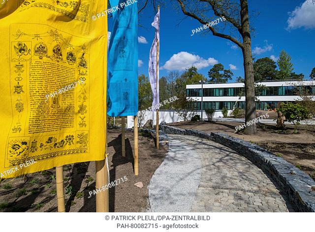 Tibetan prayer flags flying in front of the newly erected Sukhavati Spiritual Care Center in Bad Saarow, Germany, 02 May 2016