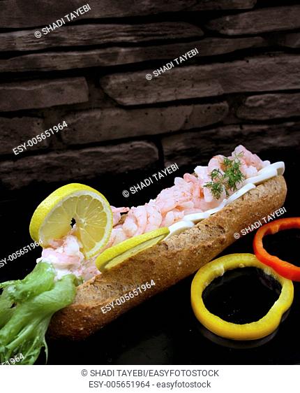 Fresh Sandwich withshrimp, lemon cucumber, pepperoni lettuce and bread