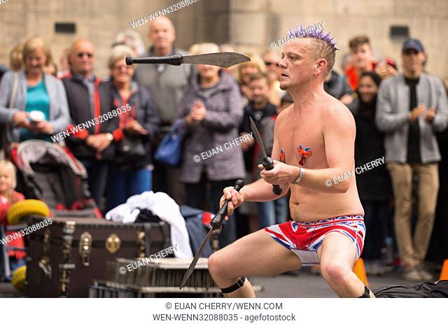 Street Performers and artists perform on the Royal Mile during the Edinburgh Fringe Festival Featuring: Street performers Where: Edinburgh