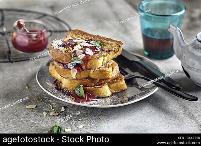 French toast with jam, toasted almonds, and mint