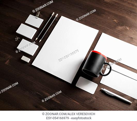 Branding mock up. Blank corporate stationery set on wood table background