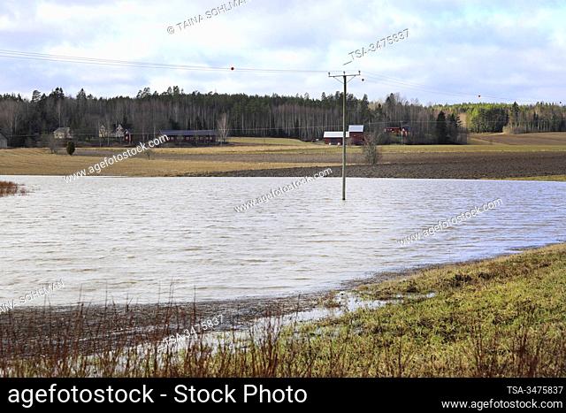 Suomusjarvi, Salo, Finland. February 23, 2020. Flooding from Aneriojarvi lake reaches cultivated fields in Suomusjarvi, Salo