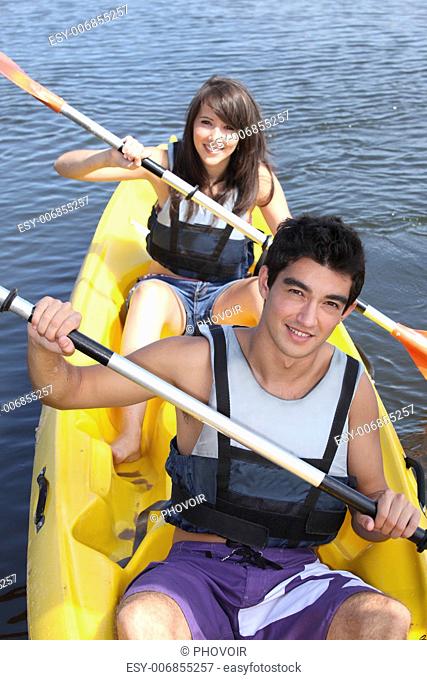 Teenagers canoeing