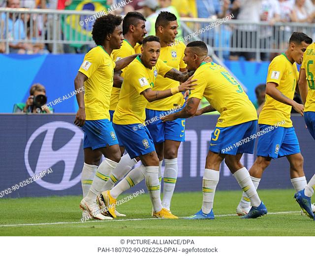 02 July 2018, Russia, Samara: Soccer, World Cup 2018, Final round - round of 16: Mexico vs. Brazil at the Samara stadium: Brazil's Neymar (C) celebrating his...