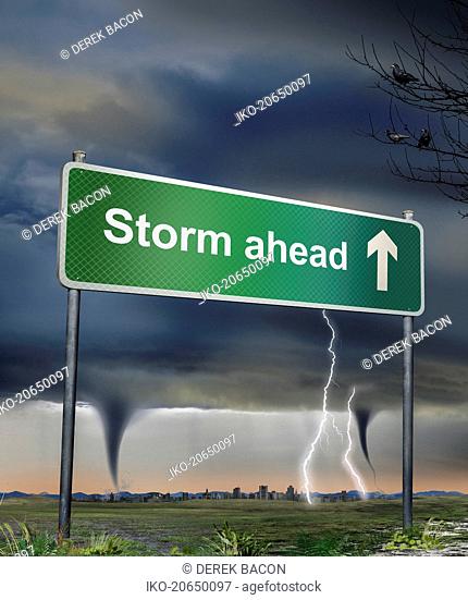 Road sign warning of storm ahead