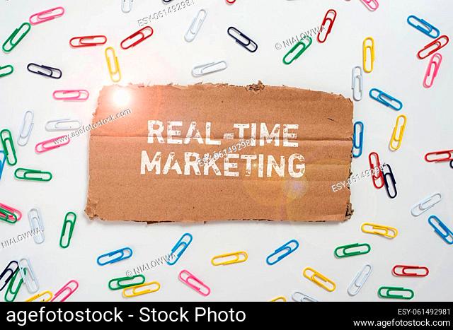 Inspiration showing sign Real Time Marketing, Business idea Creating a strategy focused on current relevant trends Man With Hand Displaying S And Glowing Lines...