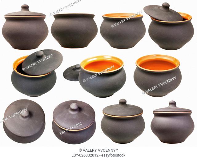 set of ceramic pots from black unglazed clay isolated on white background
