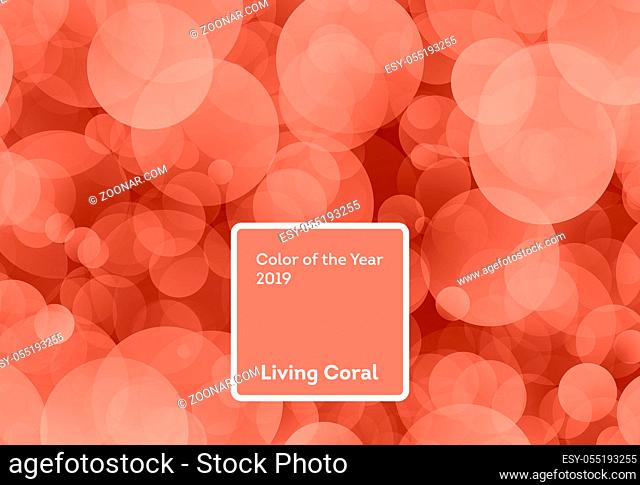 Living Coral color of the Year 2019. Bokeh background with coral in trendy color