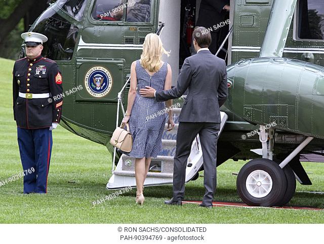 Jared Kushner and Ivanka Trump board Marine One to join United States President Donald J. Trump as they depart the White House in Washington