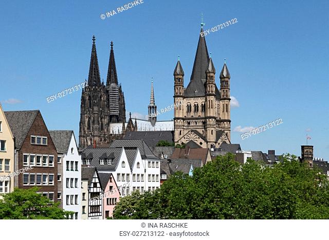 Panorama of Cologne old town with world famous Cologne Cathedral (left) and Gross St Martin (Great Saint Martin), one of Cologne's twelve famous Romanesque...