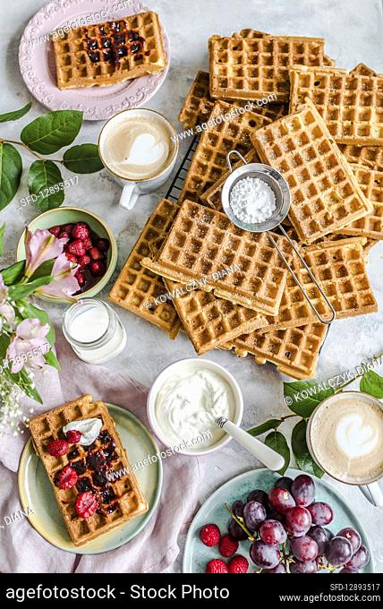 Breakfast with waffles, cottage cheese, fruit and coffee